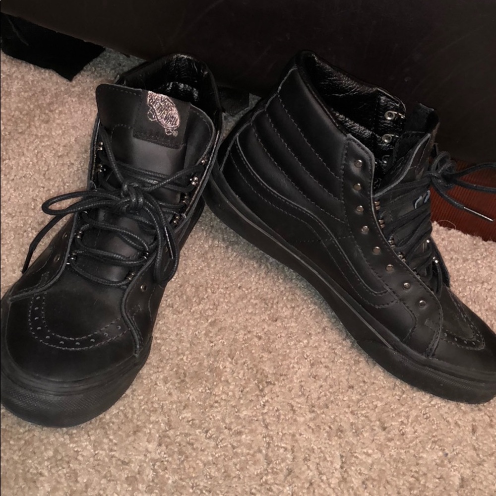 Women’s high-top leather vans size 7.5